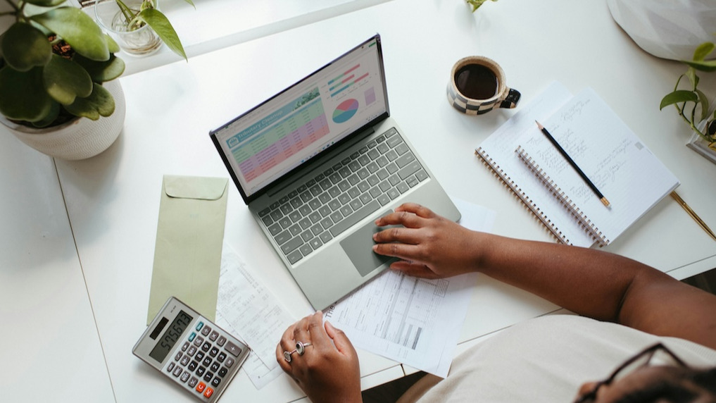 image of a laptop with graphs